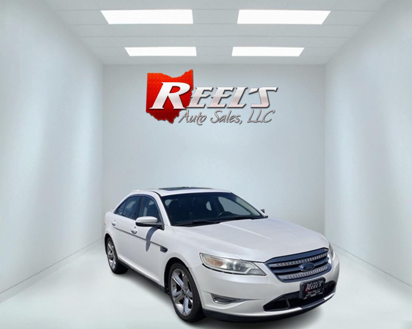 2010 White /Black Ford Taurus SHO (1FAHP2KT3AG) with an 3.5L V6 DOHC 24V TWIN TURBO engine, 6-Speed Automatic transmission, located at 11115 Chardon Rd. , Chardon, OH, 44024, (440) 214-9705, 41.580246, -81.241943 - This 2010 Ford Taurus SHO AWD is a high-performance variant of the Taurus sedan, powered by a potent 3.5L EcoBoost V6 engine that produces 365 hp and enables a 0-60 mph time of 5.2 seconds. It features an advanced AWD system, a 6-speed automatic transmission, and the SHO Performance Package. Notable - Photo#2